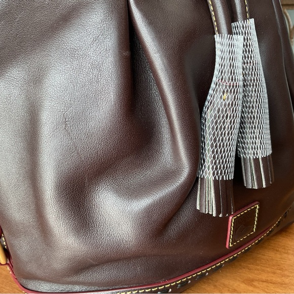 Dooney & Bourke Brown T’Moro Florentine drawstring bucket bag with whipstitch - Picture 8 of 16